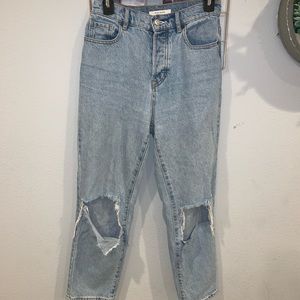 High waisted blue jeans w/ rips on knees